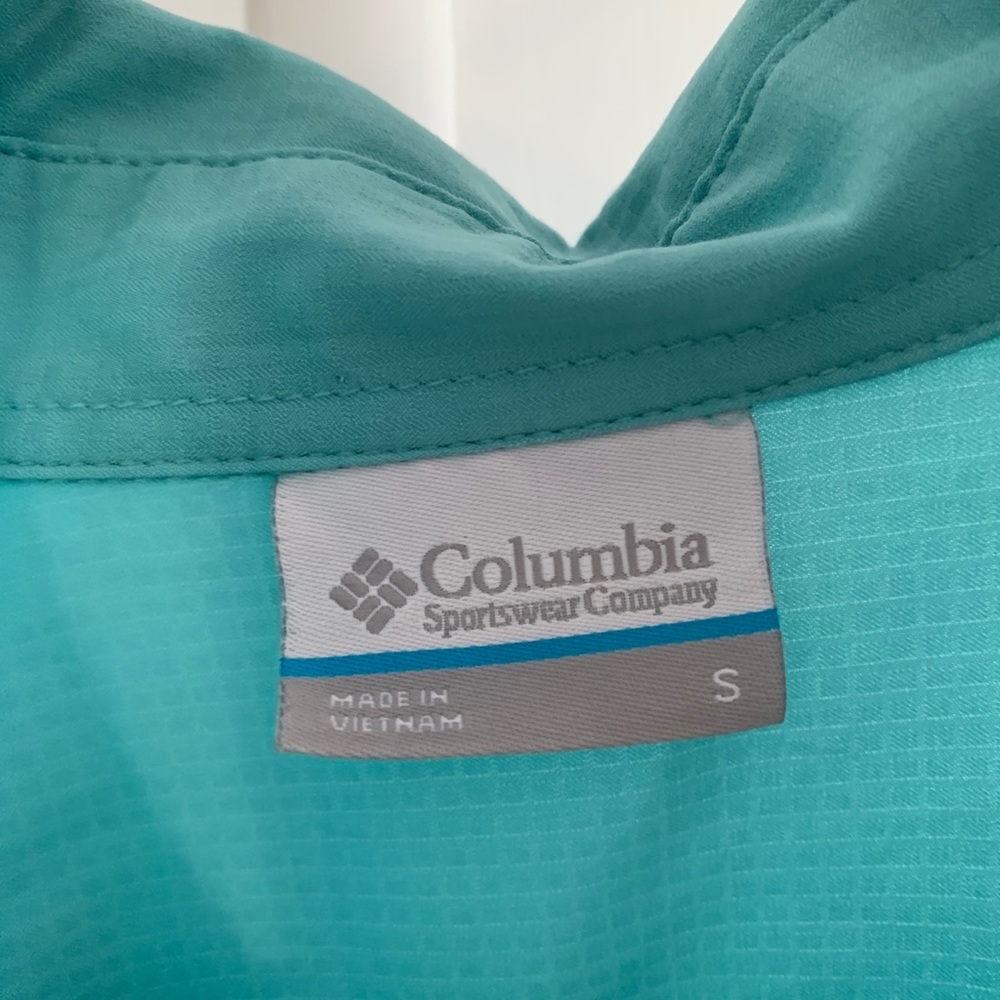 Color is more teal then light blue, men shirt